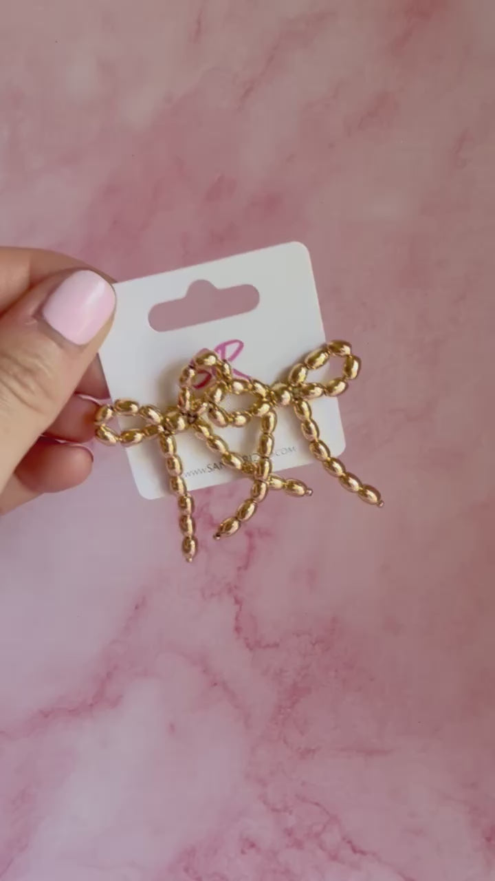 Load and play video in Gallery viewer, Beaded Gold Bow Stud
